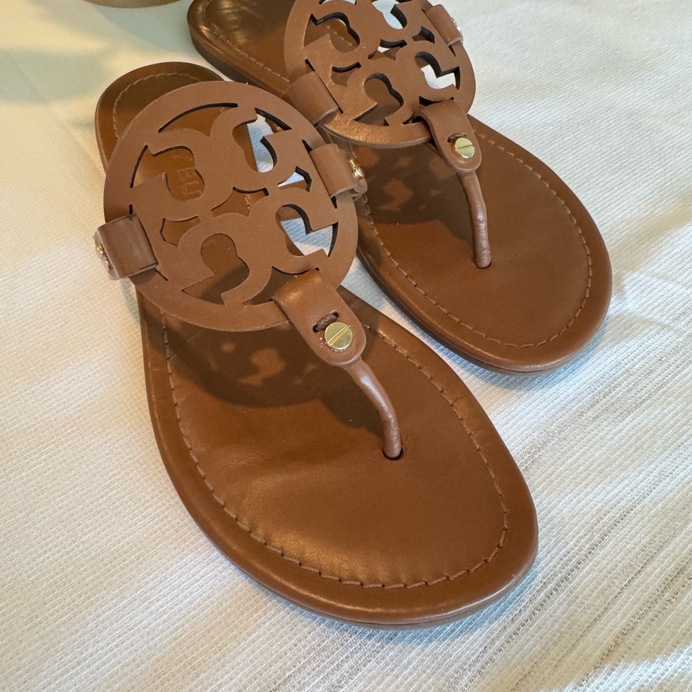 Tory Burch Brown Thong Sandals with Circular Emblem